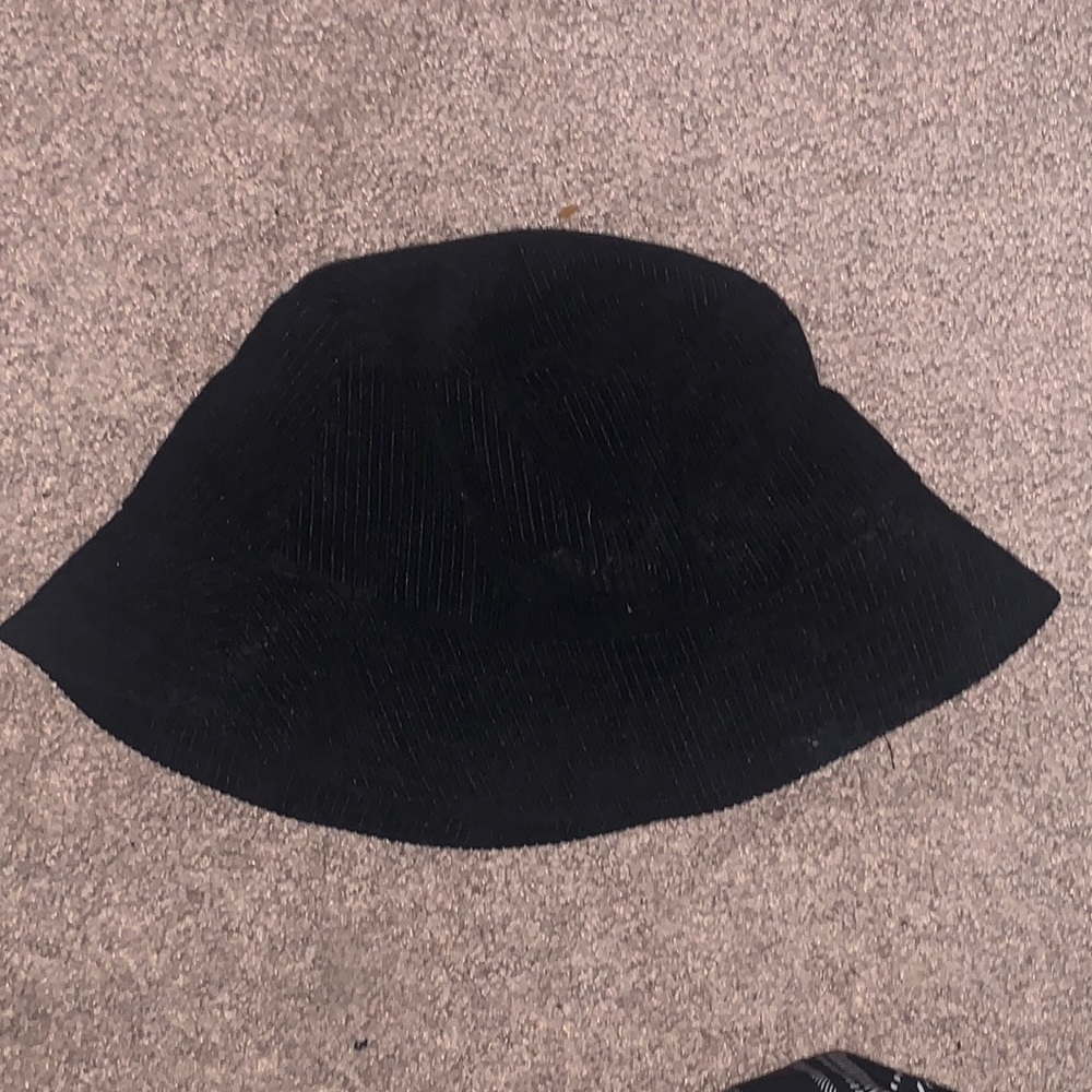 A black cotton corduroy bucket hat